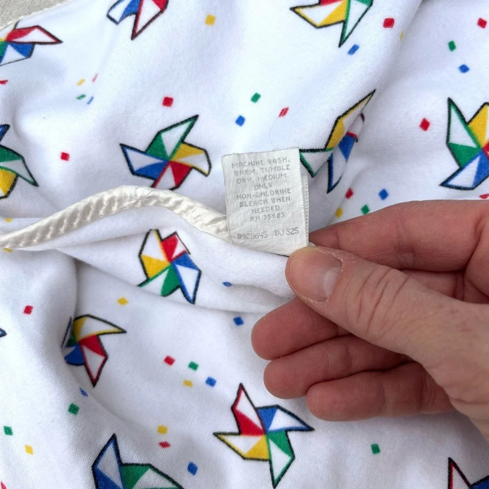 Vintage 80s Baby Dior Pinwheel Print Cotton Blanket Satin Trim White Multi 32x28